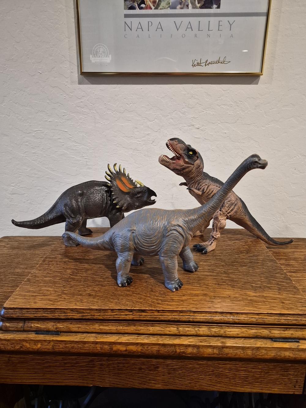 Set of three molded plastic or rubber dinosaur Toys